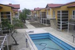 Intimate development among orange groves