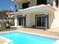 Sparkling swimming pool and relaxation area : property For Sale image
