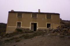 Farmhouse with large outbuilding for renovation.