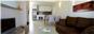 Lounge through to kitchen : property For Sale image