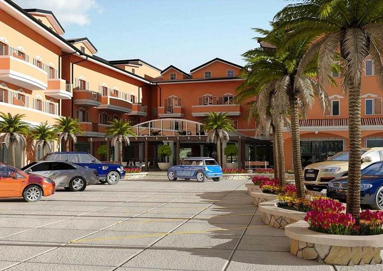 Apartments with pool at 450 meters from sandy beach.