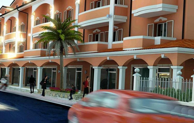 Apartments with pool at 450 meters from sandy beach.