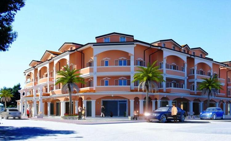 Apartments with pool at 450 meters from sandy beach.