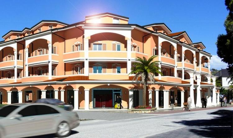 Apartments with pool at 450 meters from sandy beach.