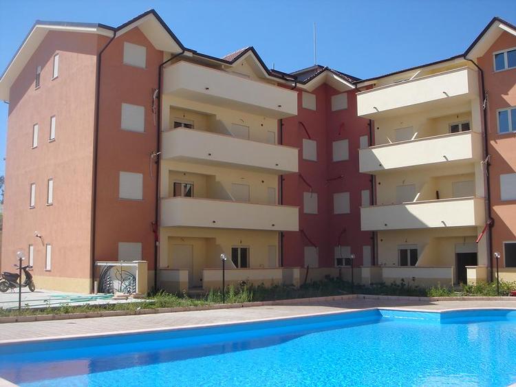 Key-ready apartments with pool. 750 meters from sandy beach.