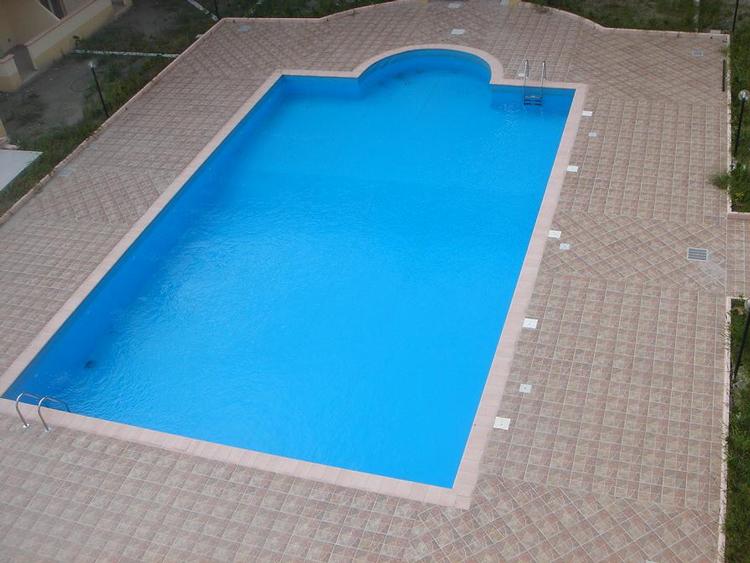 Key-ready apartments with pool. 750 meters from sandy beach.