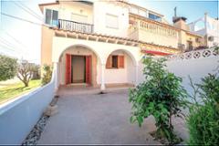 Ground apartment in gated residency with garden and pool!