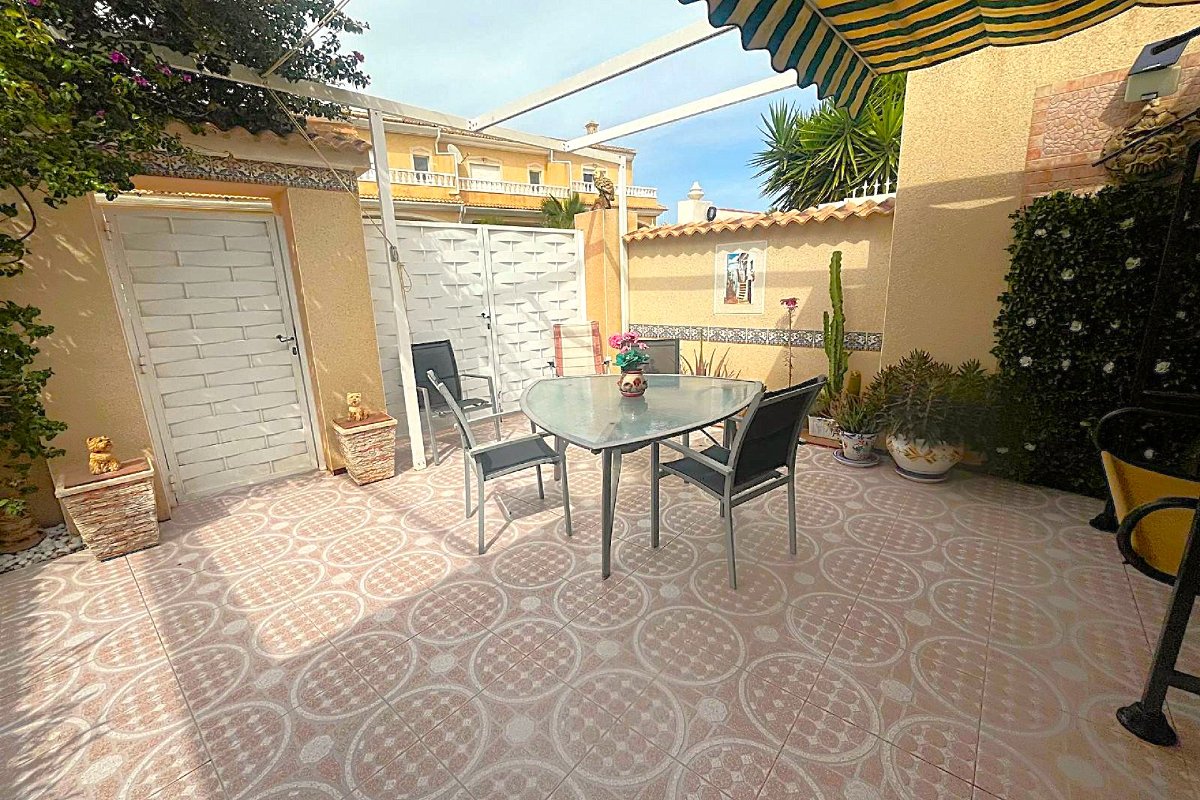 Photo 3 of Bungalow with rooftop solarium in gated community with garden and pool!