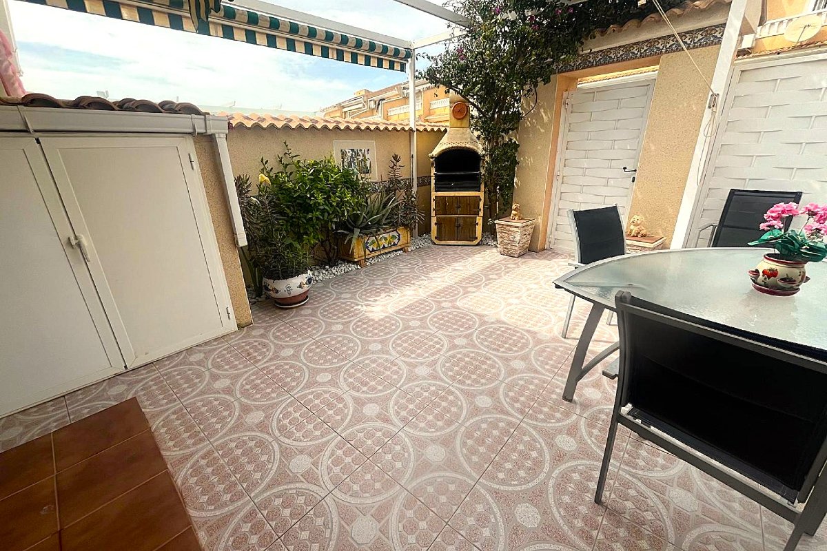 Photo 5 of Bungalow with rooftop solarium in gated community with garden and pool!