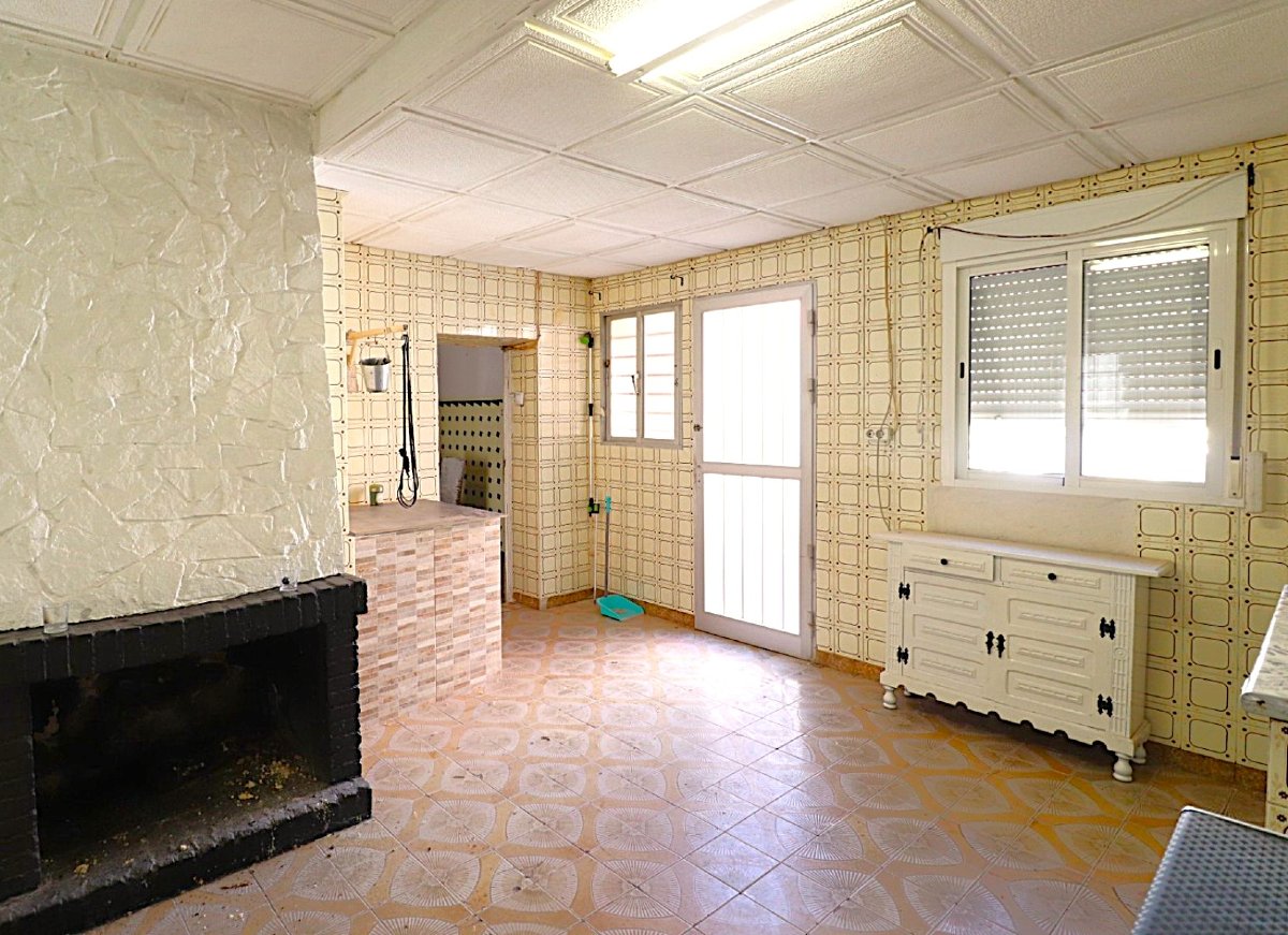 Photo 5 of DIY project. South-facing bungalow with open fireplace and rear courtyard!