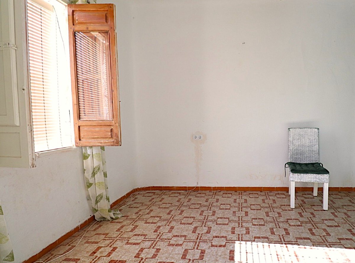 Photo 7 of DIY project. South-facing bungalow with open fireplace and rear courtyard!