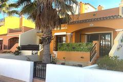 South-west facing home with solarium in luxury gated community!
